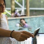 ring stand finger ring holder phone wallet stick on lycra pocket for back of phone - Black White