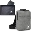Gray RFID blocking crossbody travel bag with adjustable strap and separate Faraday phone pouch shown holding a smartphone
