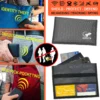 Gray RFID blocking phone pouch shown protecting a smartphone and cards from wireless scanning and digital pickpocketing while traveling